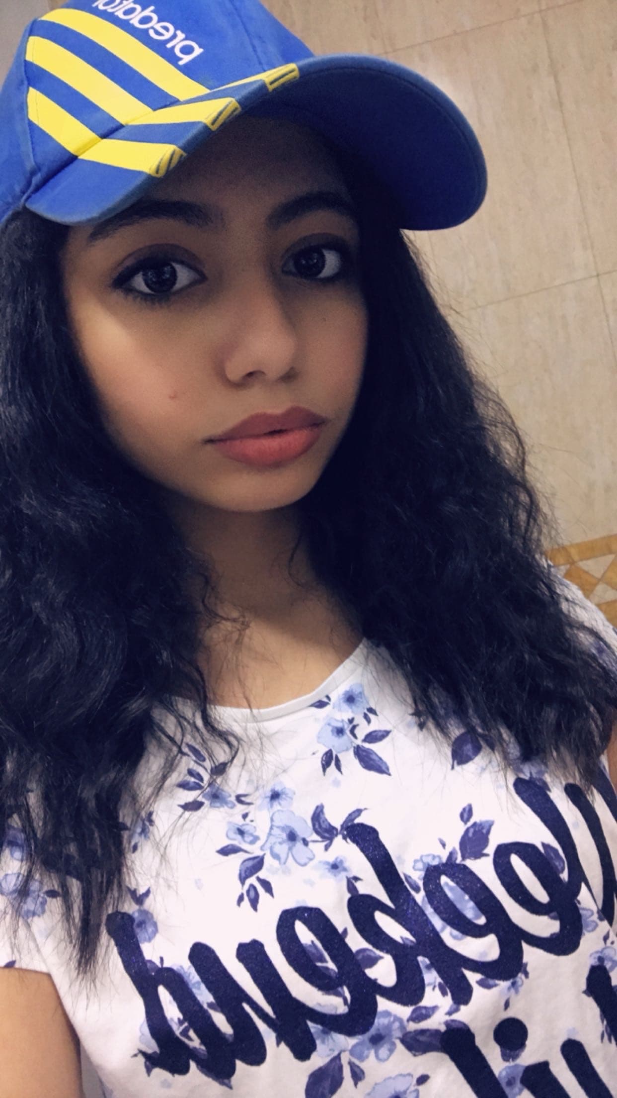 Magda in 2016, straightened hair