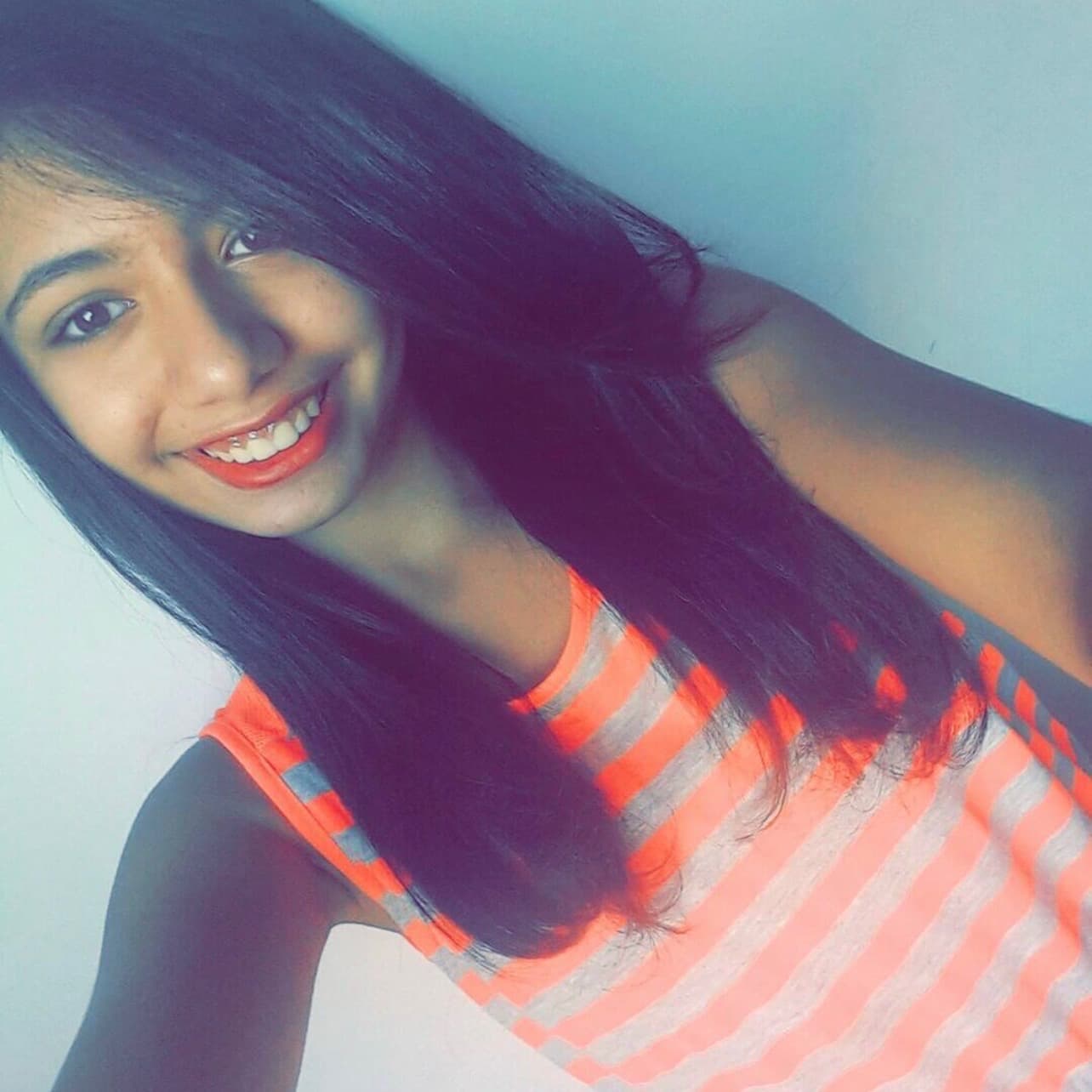 Magda in 2018, hair less damaged but still heat-styled