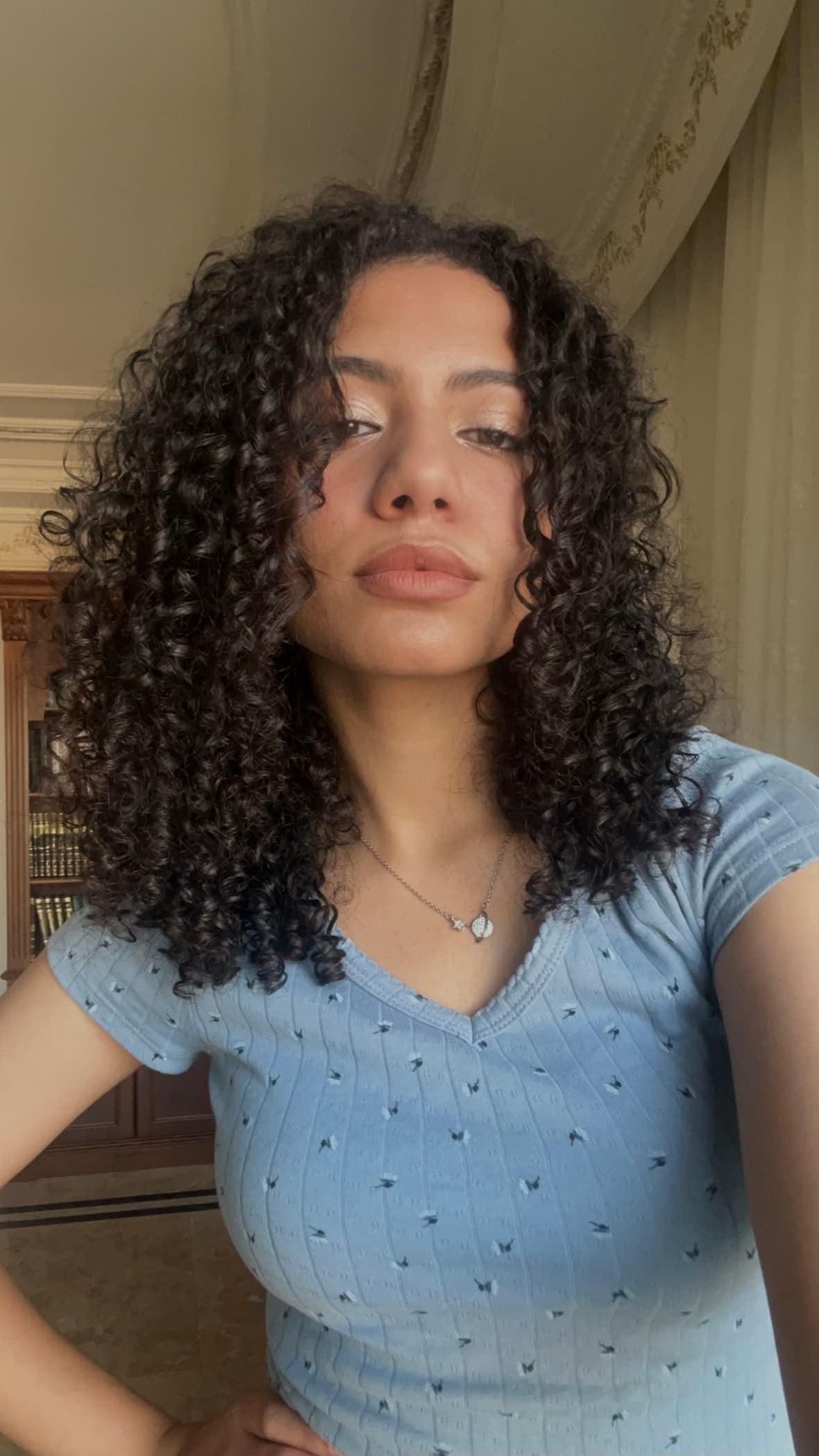 Magda today, natural 3B/3C curly hair